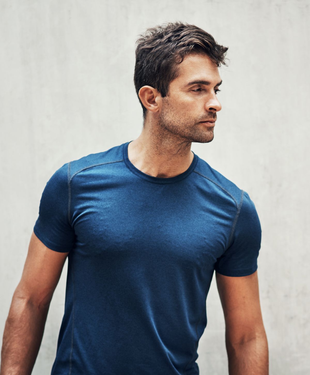 San Francisco Hair Transplant model wearing a blue shirt