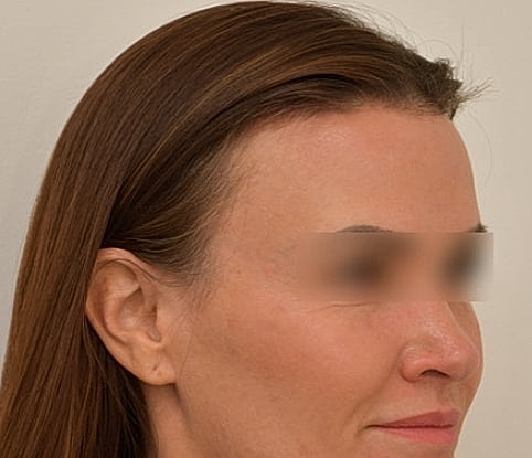 Profile view of woman with brown hair
